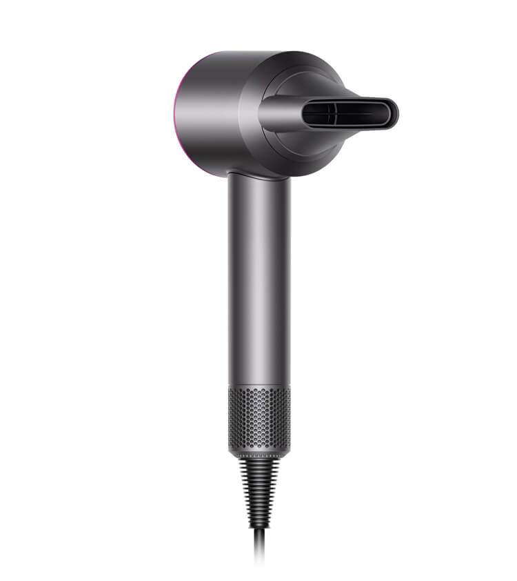 The Dyson Supersonic™ hair dryer, fitted with smoothing nozzle